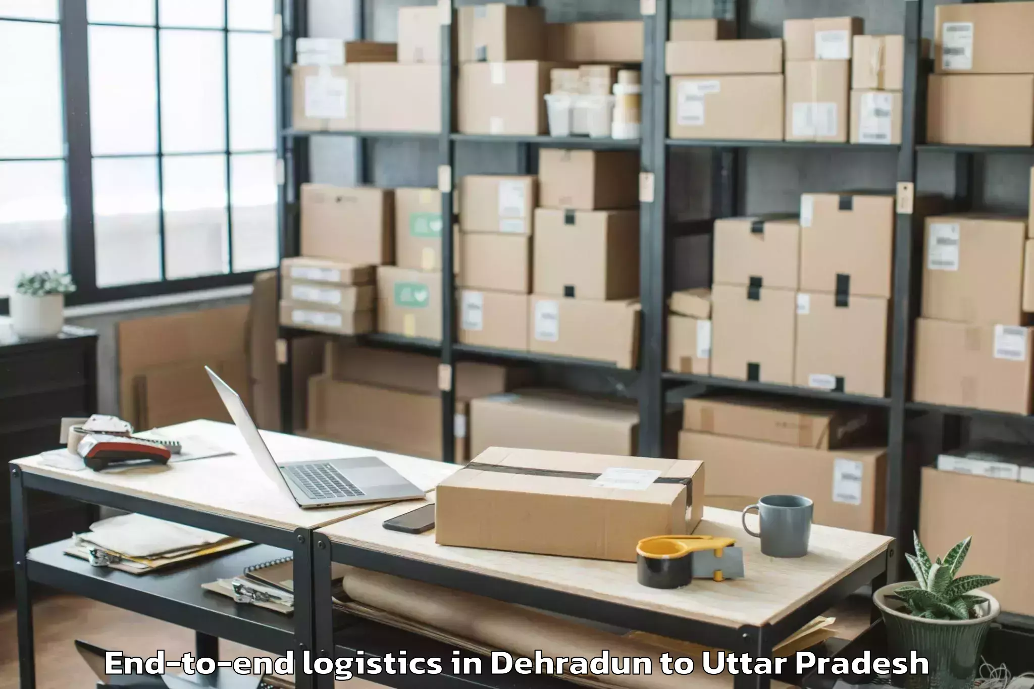 Professional Dehradun to Bansdih End To End Logistics